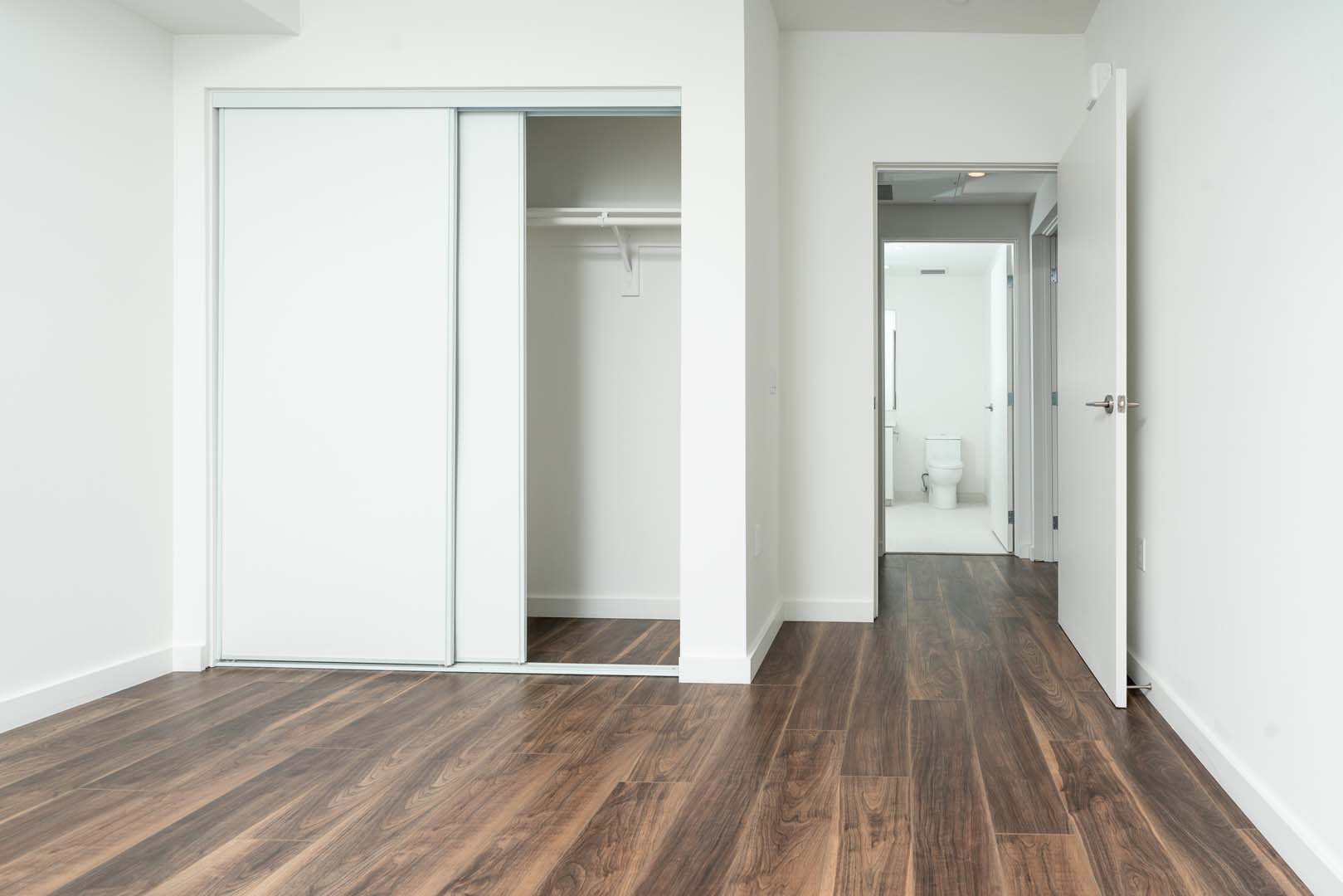 Three-Bedroom Apartments in Culver City CA - The Lucky - Bedroom with a Closet and Wood-Style Flooring